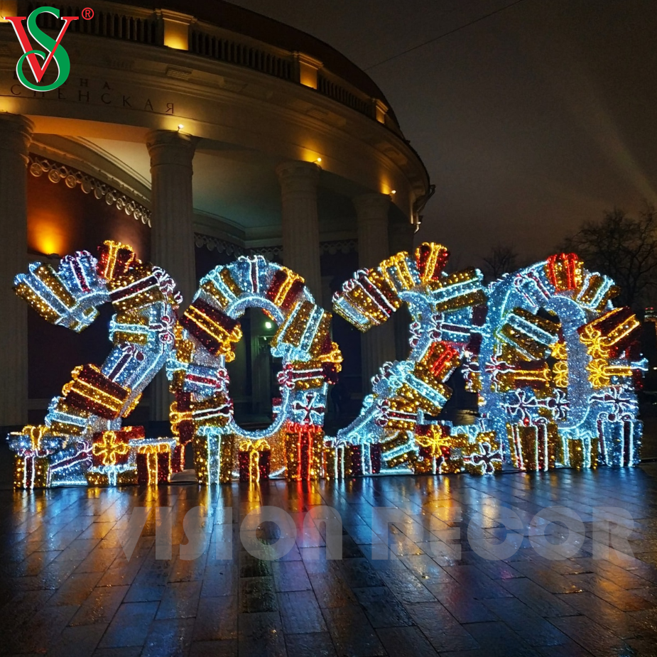 Luces al aire libre del motivo de la escultura 3D del tablero de la muestra del Año Nuevo 2026 para la decoración del Año Nuevo